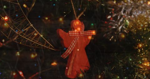 Festive Tree Decor with Angel Ornament and Twinkling Lights - Download Free Stock Images Pikwizard.com