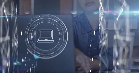 Woman typing on laptop with futuristic hud overlay, neon reflections and data interface