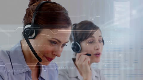 Women Using Headsets in High-Tech Digital Environment