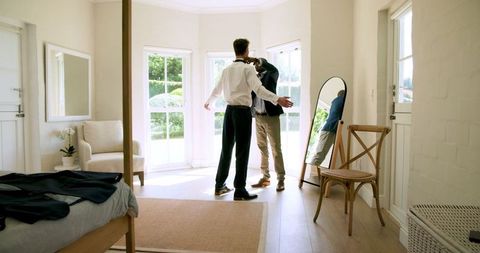 Best men share bonding moment on wedding day afterwards