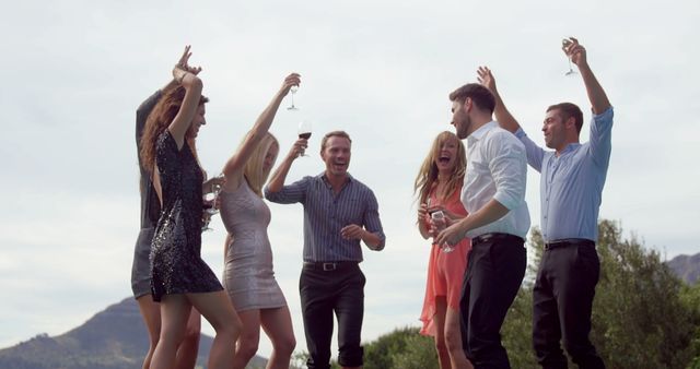 Group of Friends Celebrating Outdoor Party with Wine Glasses - Download Free Stock Images Pikwizard.com