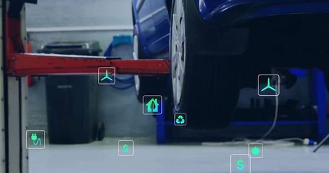 Blue car rear wheel being lifted on vehicle hoist with eco tech overlays