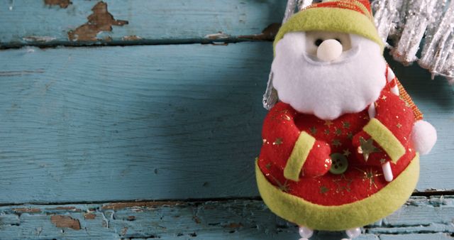 Vibrant Santa Claus Decoration on Rustic Wooden Background - Download Free Stock Images Pikwizard.com