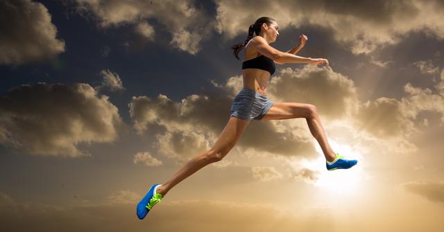 Female athlete practicing high jump with a dramatic sky and sun rays in the background. Perfect for advertisements related to fitness, sports training, high performance athletics, and motivational posters. Can be used in blogs and articles emphasizing determination, outdoor sports, and exercise routines.