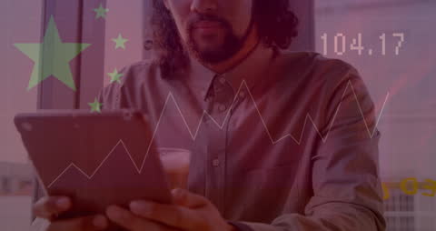 Businessman Analyzing Growth with Tablet and Graph Overlay