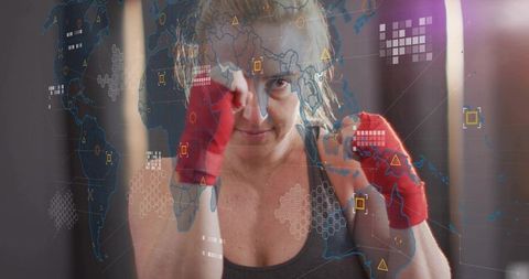 Female boxer training with futuristic hud overlay and red hand wraps, focus determination