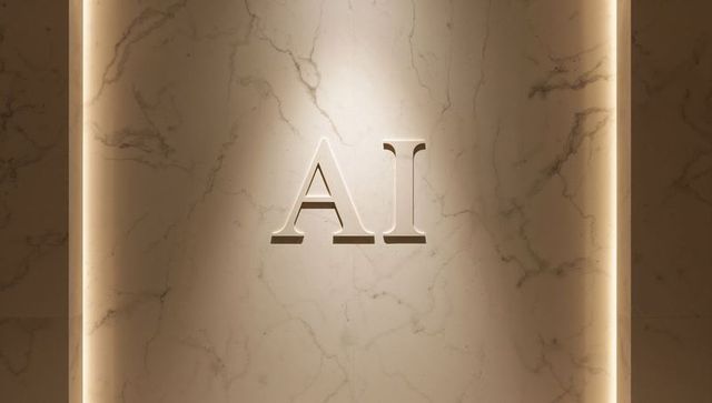 Displaying raised ai letters on marble reception wall with recessed led light strips