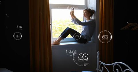 Woman Using Smartphone with 6G Technology Concept Images