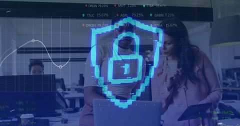 Business team analyzing data with cybersecurity overlay in modern office