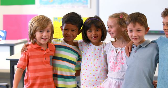 Diverse Group of Happy School Children Embracing in Classroom - Download Free Stock Images Pikwizard.com