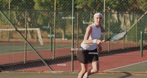 Female Tennis Player Demonstrating Skill on Outdoor Court