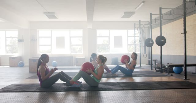 Group Fitness Class Doing Partner Exercises with Medicine Balls in Gym - Download Free Stock Images Pikwizard.com