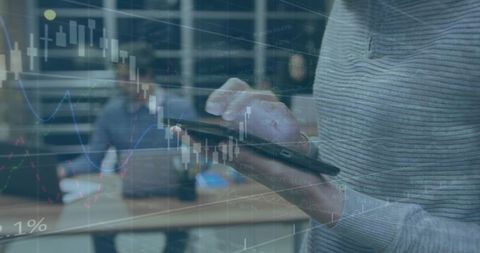 Tapping Smartphone While Analyzing Market Charts and Trading Data in Modern Office