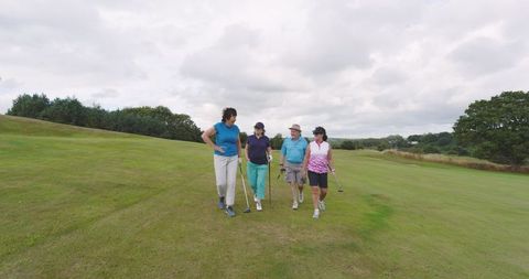 Friends enjoying a relaxed afternoon golf outing together