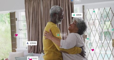 Senior Couple Dancing Connecting Emotionally in Living Room