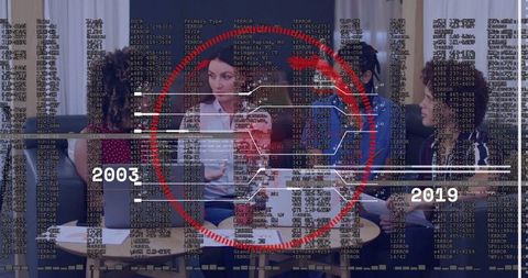 Diverse Team Collaborating in Modern Office with Digital Data Graphics Overlay