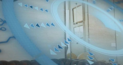 Futuristic holographic blue interface overlaying tufted chesterfield sofa and glass cabinet