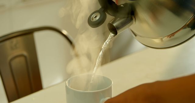 Close-up of Pouring Hot Water into Coffee Cup with Steam - Download Free Stock Images Pikwizard.com