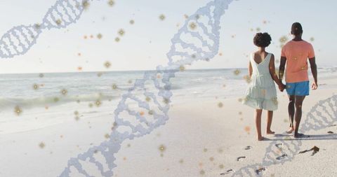 Romantic Couple Strolling on Beach with Symbolic DNA Overlays