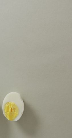 Minimalist Hard Boiled Egg Halves on Grey Background - Download Free Stock Images Pikwizard.com