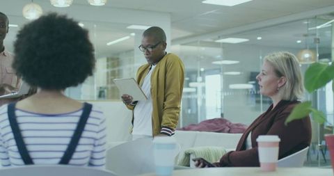 Team Collaboration in Modern Office Lounge Environment