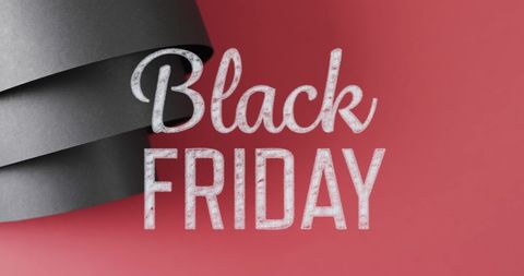 Black Friday Sale Design with Rolled Black Paper on Red