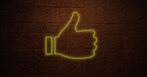 Neon Thumbs Up Glowing Against Brick Wall Background - Download Free Stock Images Pikwizard.com