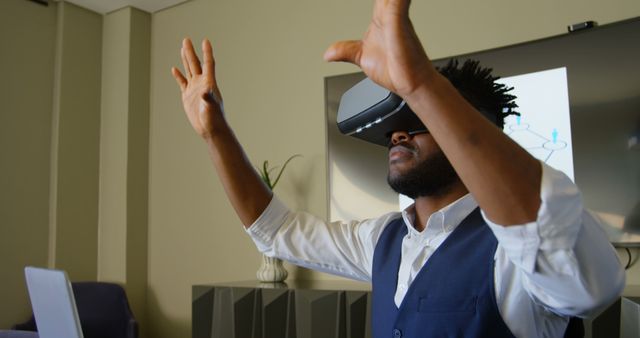 Man Experiencing Virtual Reality in Office Environment - Download Free Stock Images Pikwizard.com