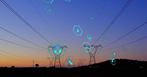 Futuristic interface overlay on power lines at sunset