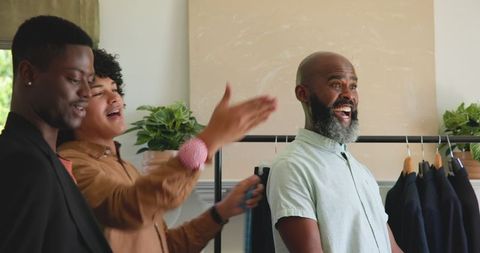 Groom Preparing with Friends Sharing Laughter and Joyful Moments