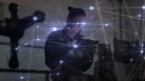 Female Worker Navigating Digital Network with Tablet