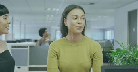 Confident Professional Speaking in Dynamic Office Setting