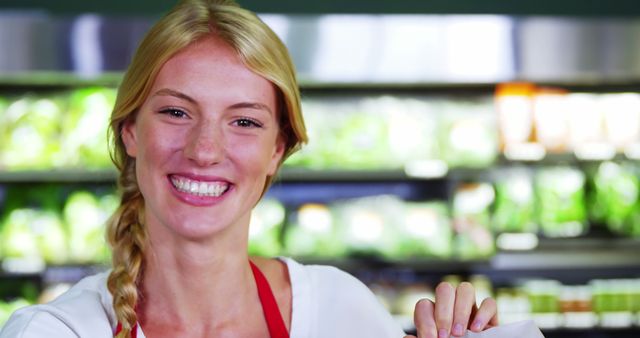 Happy Grocery Store Employee Smiling in Produce Section - Download Free Stock Images Pikwizard.com