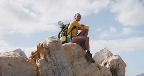 Woman Enjoying Hiking Adventure on Rocky Terrain - Download Free Stock Images Pikwizard.com