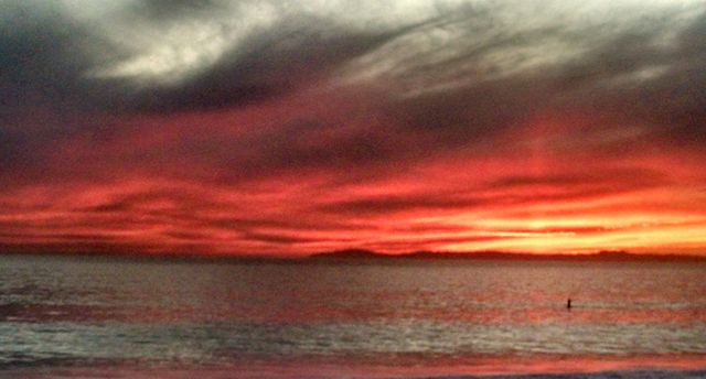 Beautiful Sunset with Dramatic Clouds Over Ocean Horizon - Download Free Stock Photos Pikwizard.com