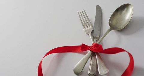 Elegant Cutlery with Red Ribbon for Romantic Dining - Download Free Stock Images Pikwizard.com