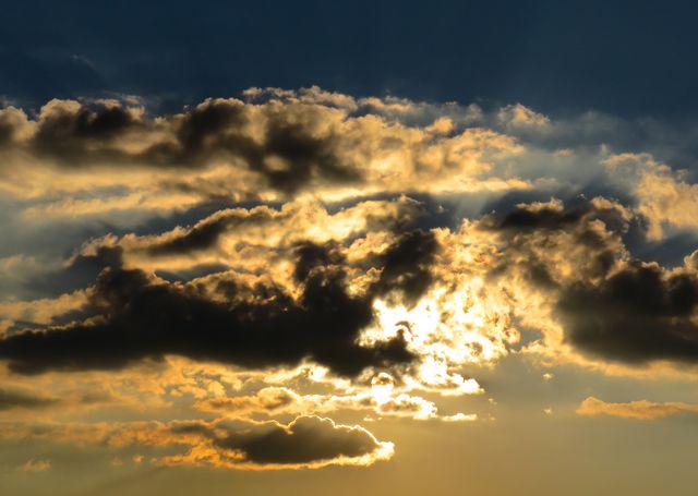 Dramatic Sunset Sky with Illuminated Clouds - Download Free Stock Photos Pikwizard.com