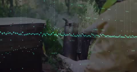 Beekeeper Operates Smoker with Data Overlay on Hive Environment