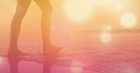 Person Strolling on Sunset Beach with Gentle Ocean Waves - Download Free Stock Images Pikwizard.com