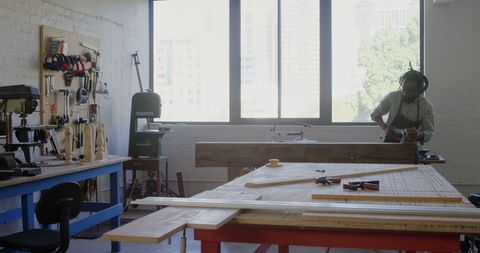 Craftsman Working in Sunlit Carpentry Studio - Download Free Stock Images Pikwizard.com
