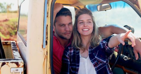 Couple Exploring Countryside in Vintage Truck