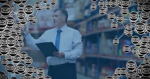 businessman analyzing delivery processes in warehouse - Download Free Stock Images Pikwizard.com