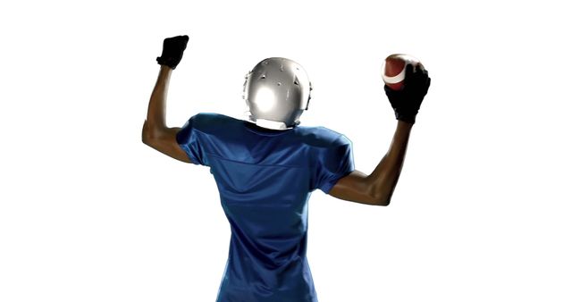 Image shows a football player from behind in blue uniform, holding football. Useful for articles, sports promotions, and fitness ads emphasizing action and athleticism.