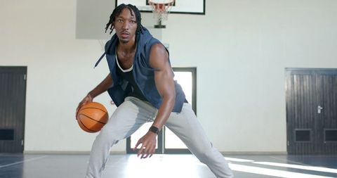 Basketball Player Dribbling Boldly on Court