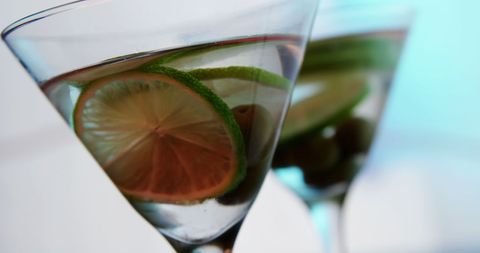 Close-Up of Martini Glass with Lime Slice in Elegant Setting - Download Free Stock Images Pikwizard.com