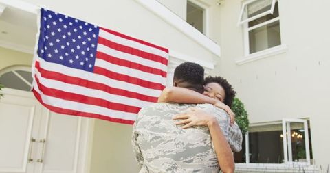 Soldier Homecoming Emotional Reunion with Family and American Flag