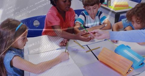 Diverse students collaborating on school project with teacher guidance