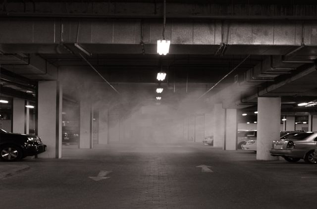 Foggy Underground Parking Garage With Dim Lighting - Download Free Stock Photos Pikwizard.com