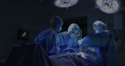 Surgical Team Performing Operation in Sterile Environment