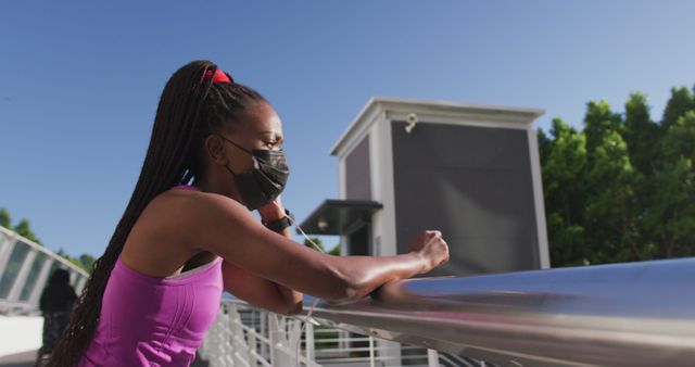 Pensive African American Woman in Sportswear with Face Mask - Download Free Stock Images Pikwizard.com